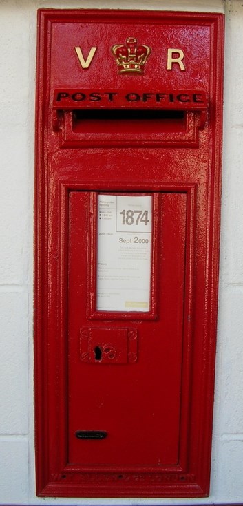 Royal Mail wall mounted postbox with VR insignia