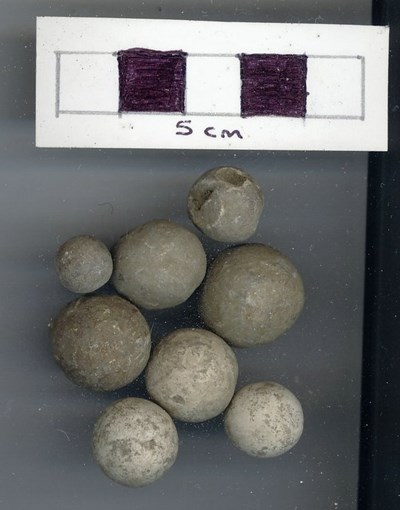 Objects discovered on Pitgrudy Farm - eight musket balls