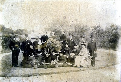 Group photograph taken in a garden late 19th early/20th century