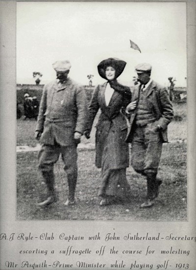 Club Captain and Secretary escort suffragette from Dornoch course