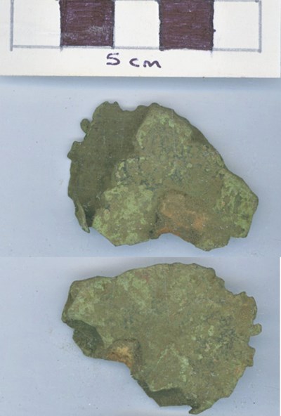 Objects discovered on Pitgrudy Farm - Leaded copper alloy fragment