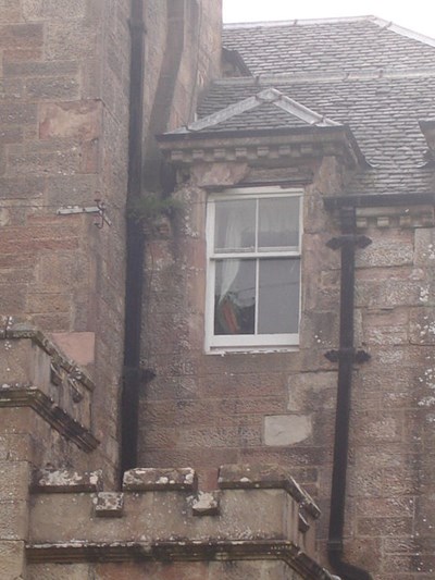 Burghfield House Hotel window in need of restoration