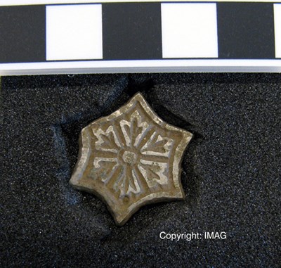 Treasure Trove objects from Burghfield, Dornoch - Floral mount