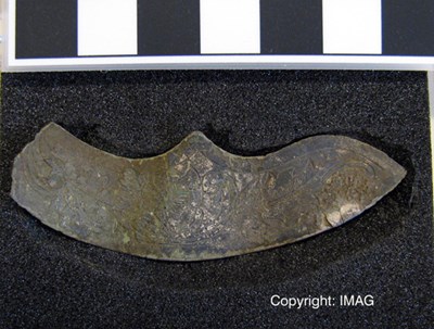 Treasure Trove objects from Burghfield, Dornoch -tinned fragment
