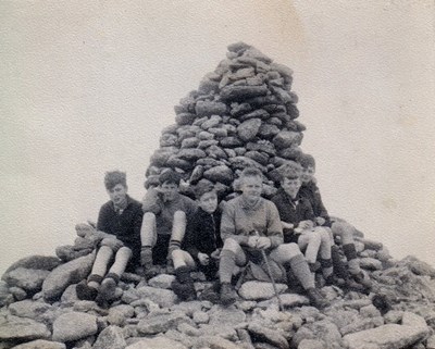Group of scouts on mountain summit