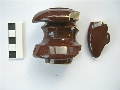 Brown glazed ceramic insulator - from Archaeological work Littleferry