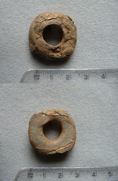 Copper alloy (?) spindle whorl