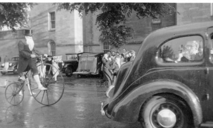 Penny Farthing rider at Coronation pageant 1953