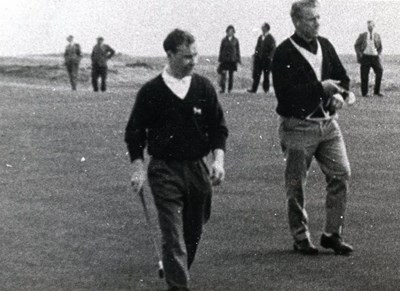 Golfers walking on the course