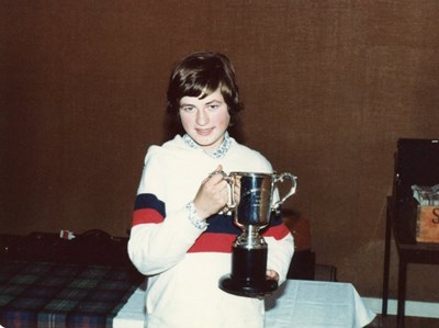 Teenage girl with trophy at the Royal Dornoch