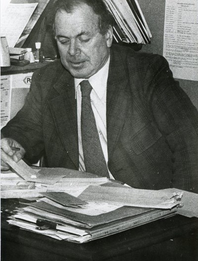 Ken Murray at his desk