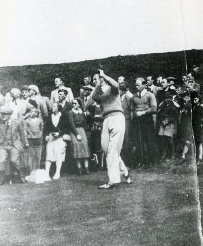 Spectators enjoy a tee shot