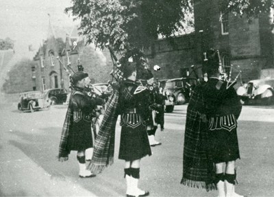 Pipers in Dornoch Square  c 1950