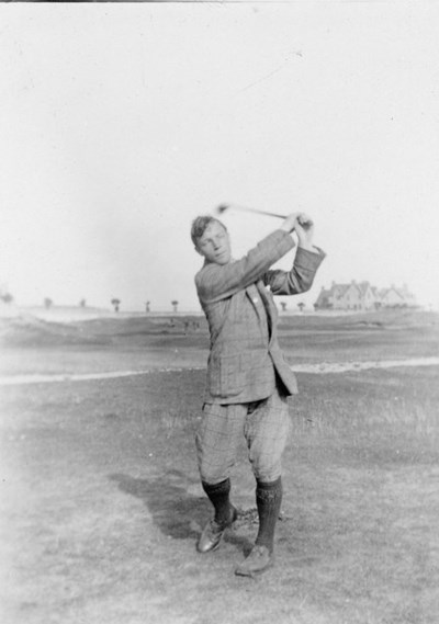 Golfer completing his swing