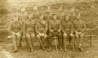 Group photograph of an officer and his platoon