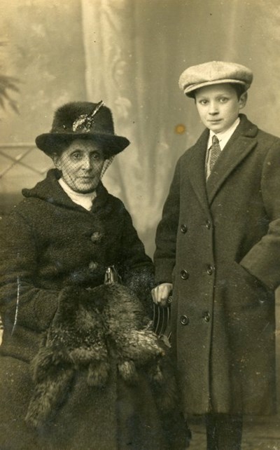 Studio photograph of a lady and young man