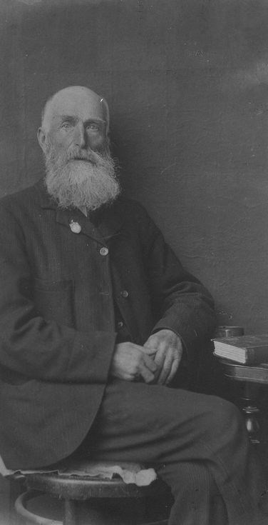 Negative studio photograph of bearded gentleman