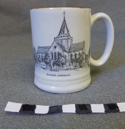 Small commemorative pottery mug