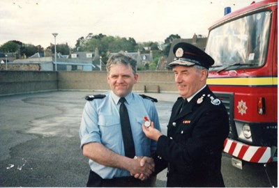 Presentation of a Long Service Medal in 1990's