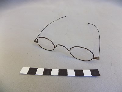 Pair of wire framed magnifying spectacles