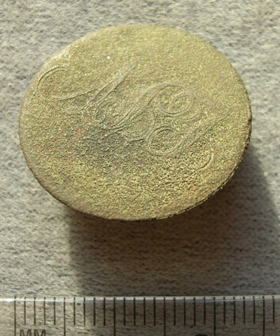 Corroded metal button found at Burghfield