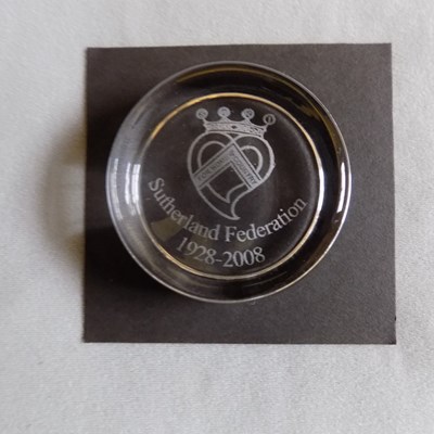 Paperweight commemorating 80 years of the Sutherland Federation.
