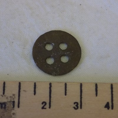 Metal button found at Dalnamain