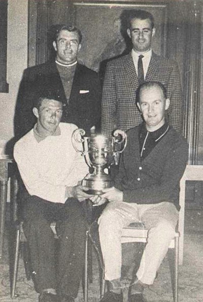 Four golfers with their trophy at Royal Dornoch Golf Club