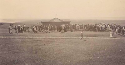 A large crowd gathered round the first tee