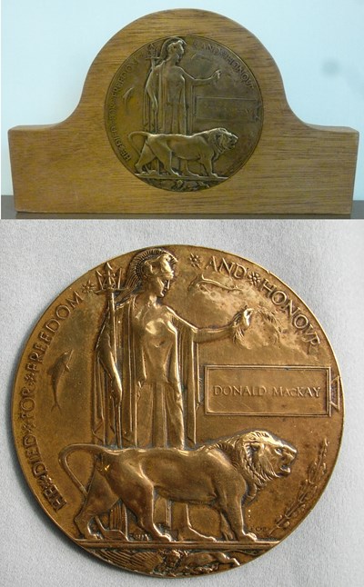 WW! Death Plaque mounted in a wooden stand