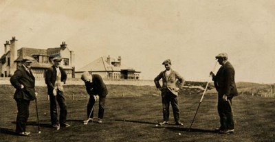 Foursome putting on Royal Dornoch course c 1930