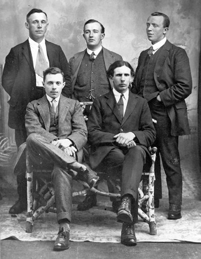 Portrait of five men