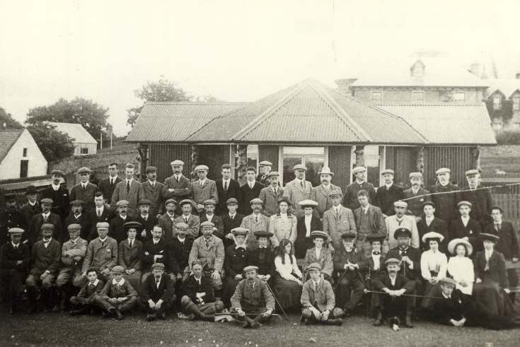 Group outside golf pavilion (c.1900)