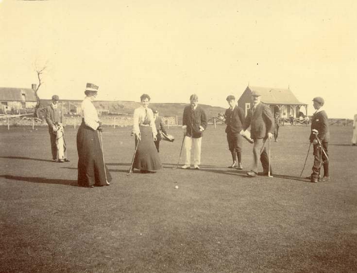 Golfers on the 18th hole of the ladies' course