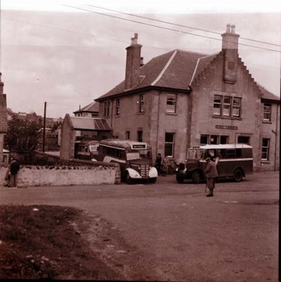 Post office and mail buses at Lairg