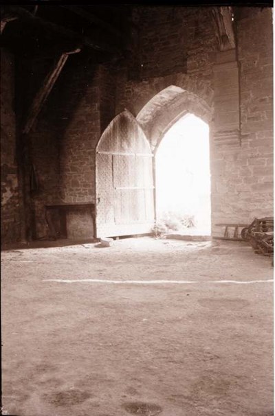 Photograph of the inside doorway of an old building.