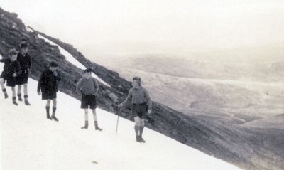 Scouts climbing in snow