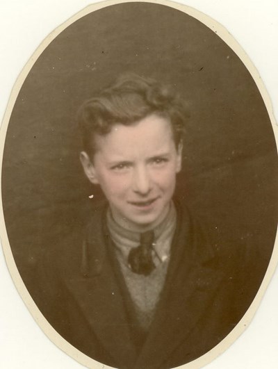 Portrait photograph of a boy later to become a scout