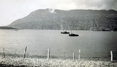 Two boats at anchor in a loch