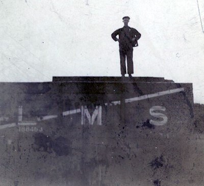 James Matheson standing on LMS railway truck at Skelbo
