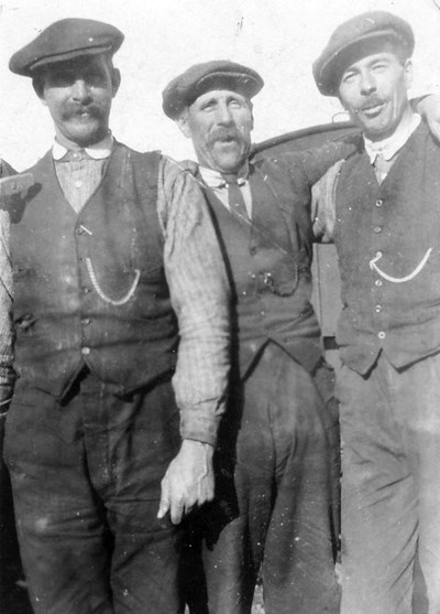 Three railway workers at Skelbo