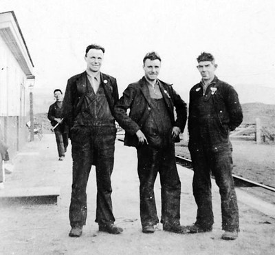 Four railway workers at Skelbo station