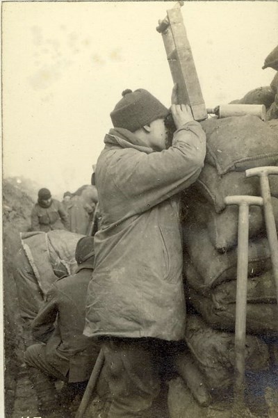 Barley using a trench periscope