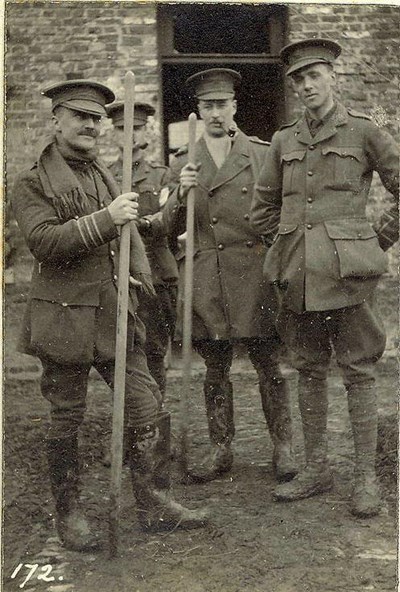 Four officers standing outside building