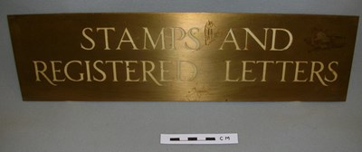 Post Office sign 'Stamps and Registered Letters'