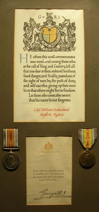 Framed scroll and medals LCpl William Sutherland