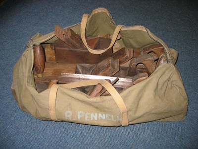 Canvas holdall containing joiner's tools