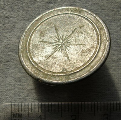 Metal button found at Burghfield