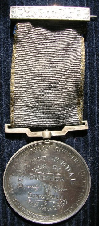 Curling club medal won by Dornoch 1897