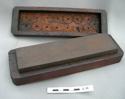 Sharpening oil stone in a wooden box